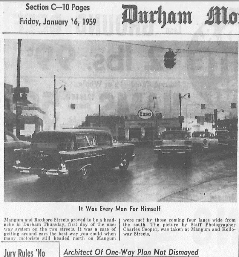 January 16, 1959 Morning Herald photogrpah of cars heading the wrong way up newly-converted, one-way Mangum Street
