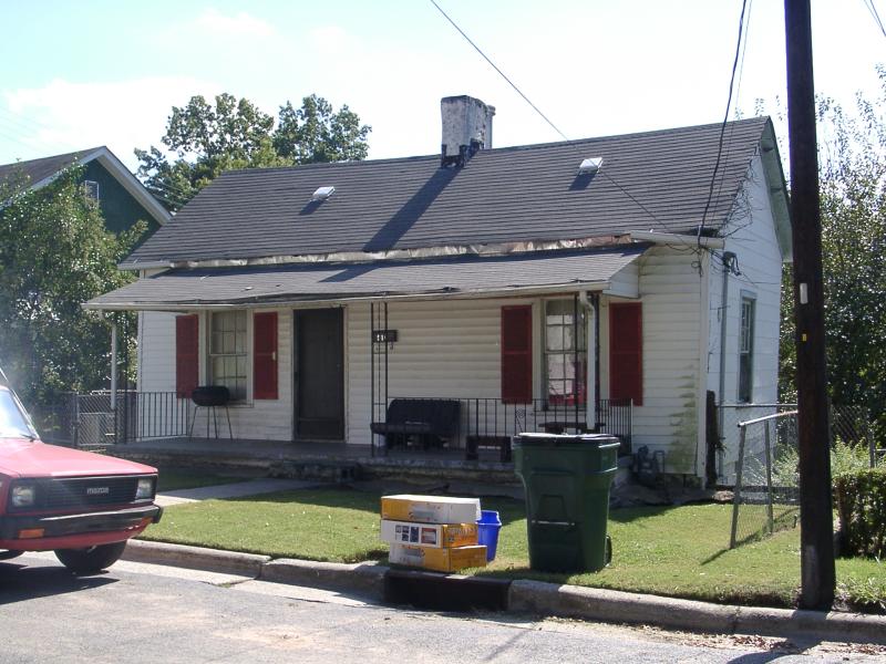 Street view image of a one-story white house with red shutters at 516 Gray Avenue.