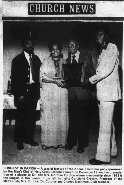 A photograph of Mrs. Eugenia Allbritton Cordice and Dr. Norman H. Cordice receiving a plaque for holding the longest membership at the Holy Cross Catholic Church in Durham.