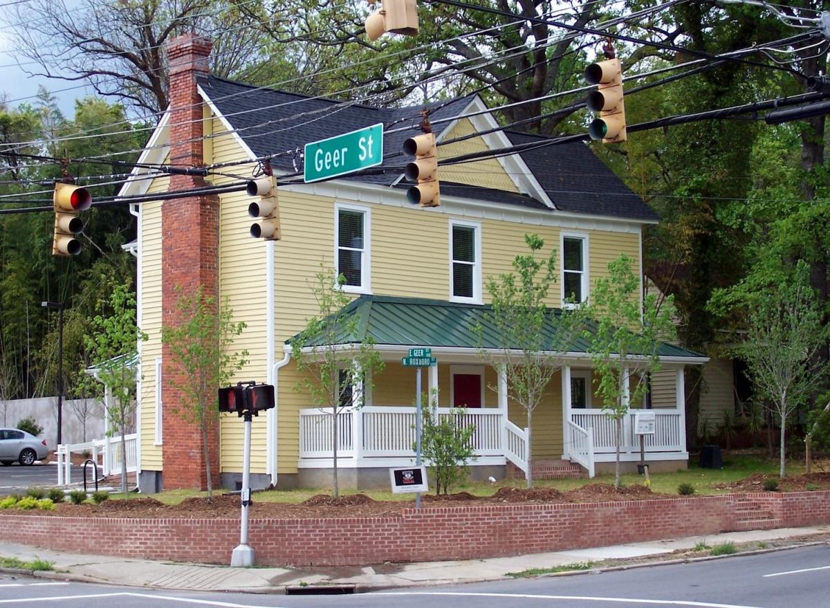 Reinvestment Partners renovated this historic farmhouse and converted it into office space.